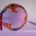 firo: 12.03.2020 Football, 2020 The corona virus paralyzes the whole sport. Game ball with clinical thermometer, mouth protection, symbol for the crisis in sport and society. Covid 19, ball